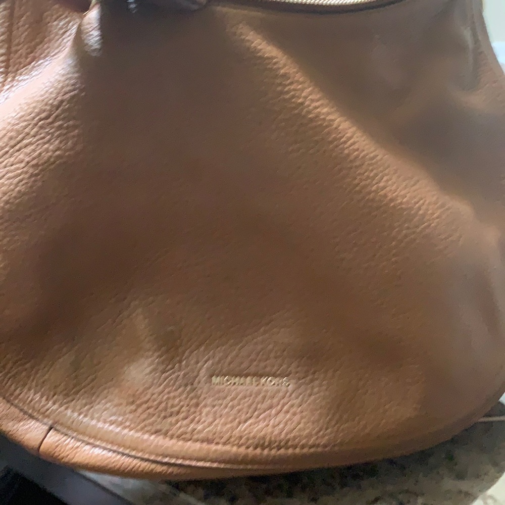 Mk tan used ladies bag